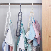 Load image into Gallery viewer, Rotate Anti-skid Folding Magic Clothes Hanger